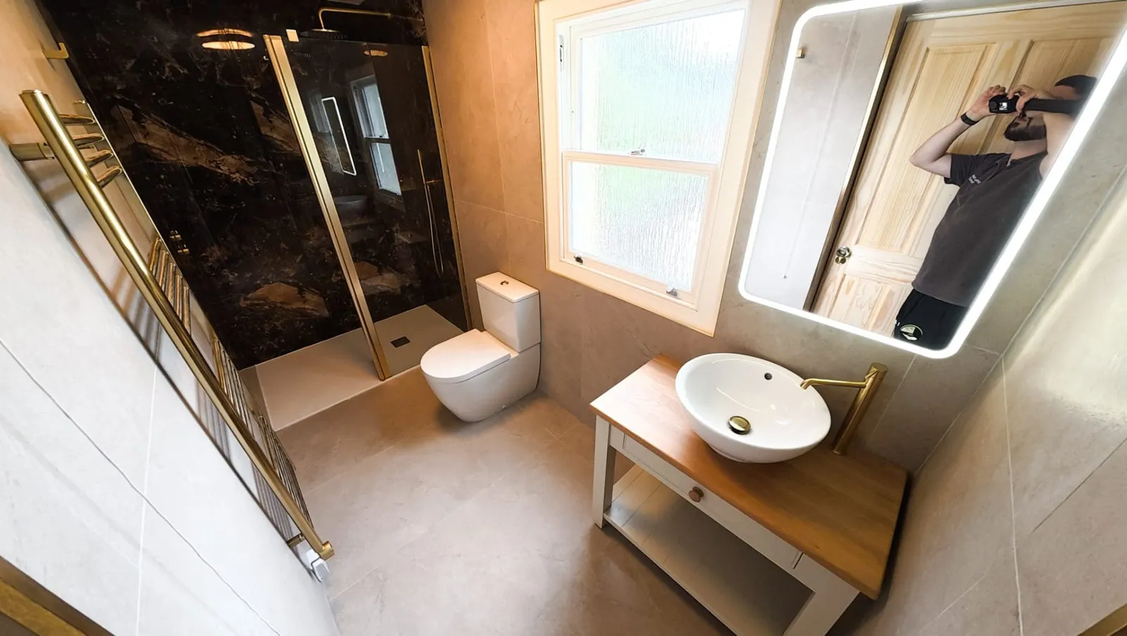 Luxury Tiled Bathroom with Brushed Brass fittings