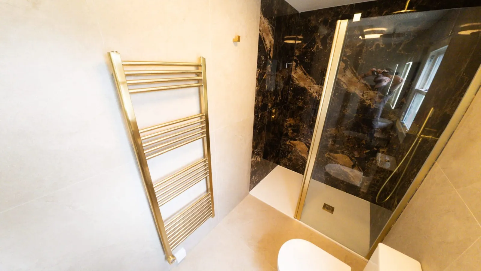 Luxury Tiled Bathroom with Brushed Brass fittings
